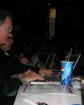 A row of Macs at the press table