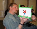 Scott Lemon shows off his XO Laptop